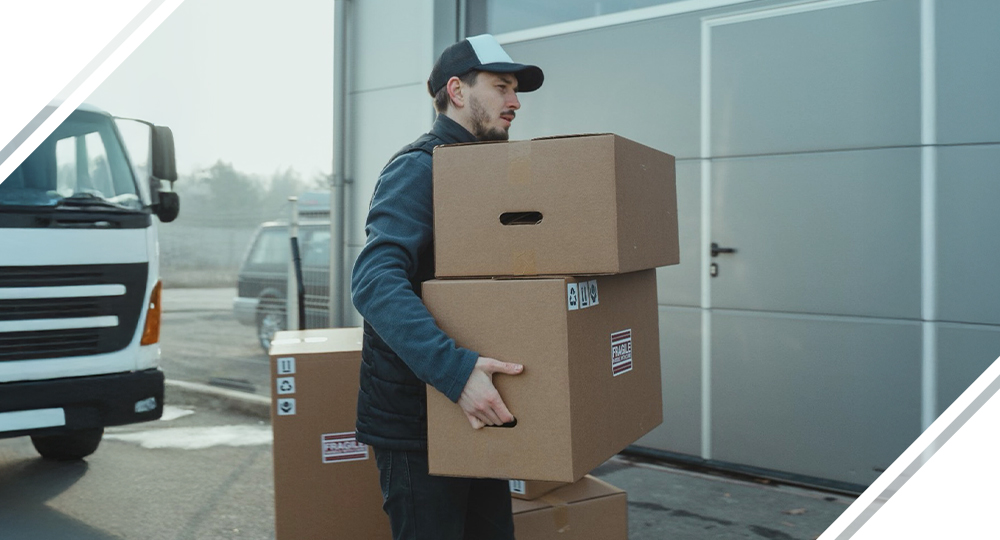 Delivery driver dropping off fragile boxes